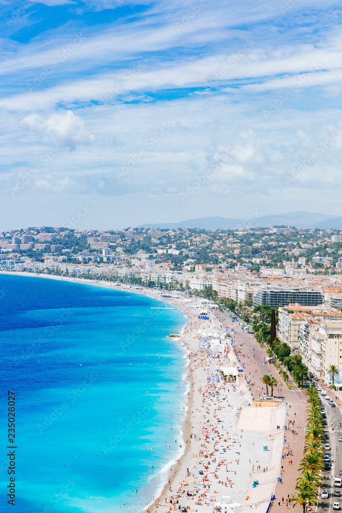 Buildings and beaches next to blue sea in the city of Nice, France