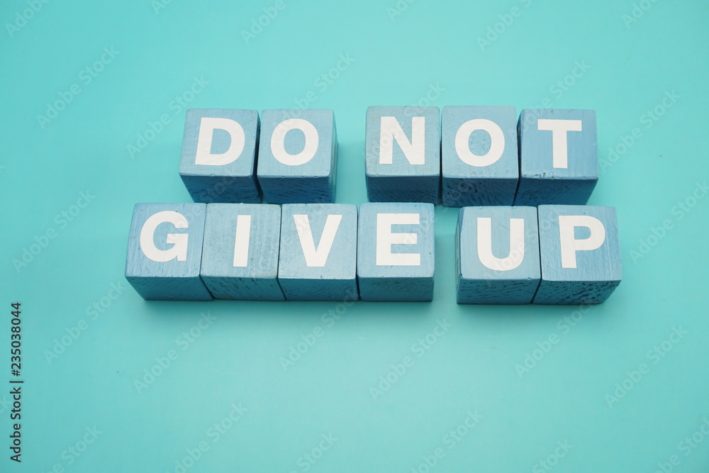 do-not-give-up-word-made-from-wooden-cubes-with-letters-alphabet-on