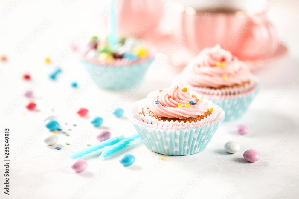Strawberry cupcakes with color candies