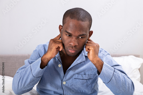 Εκτύπωση καμβά Man Covering His Ears With Finger