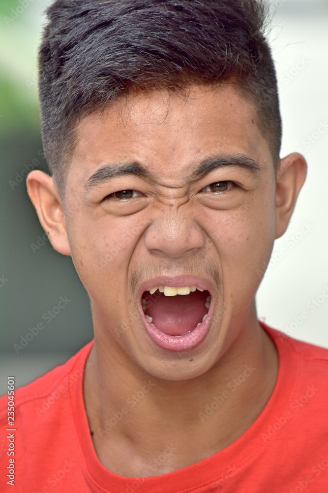 Youthful Minority Male Yelling Youthful Minority Male Yelling