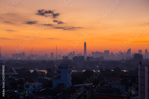 Sunrise scence of Bangkok . Orange sky in the morning at sunrise in Bangkok.