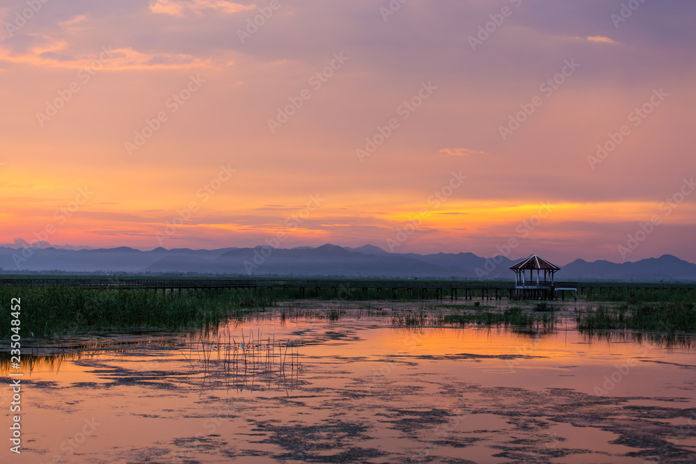 Beautiful landscape with wooden house and mountains in sunset, Bueng Bua at Sam Roi Yot National Park, Prachuap Khiri Khan Thailand