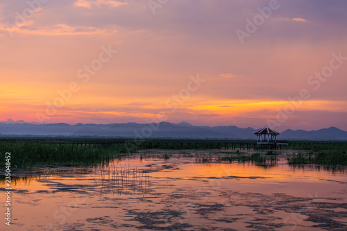 Beautiful landscape with wooden house and mountains in sunset  Bueng Bua at Sam Roi Yot National Park  Prachuap Khiri Khan Thailand