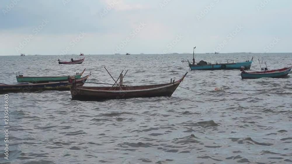 Many small fishing boats of local fisherman in Thailand. Skyline at sea. Many small fishing boats of local fisherman in Thailand. Skyline at sea.