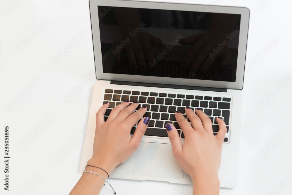 Fototapeta premium business woman working in her office on her laptop. Business concept