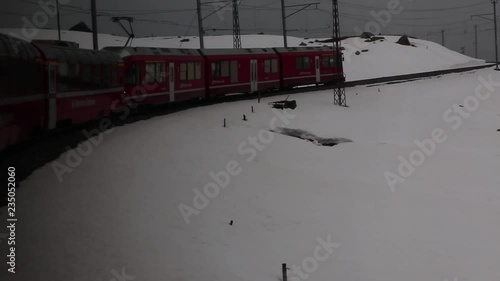 Train journey with the Bernina Express through the canton Graub√ºnden in Switzerland. photo