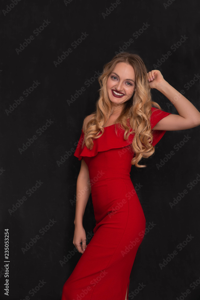 Beautiful woman wearing red dress and looks so happy. Christmas. Beautiful woman wearing red dress and looks so happy. Christmas.