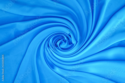 Romantic blue fabric twisted texture with soft folds - perfect for background