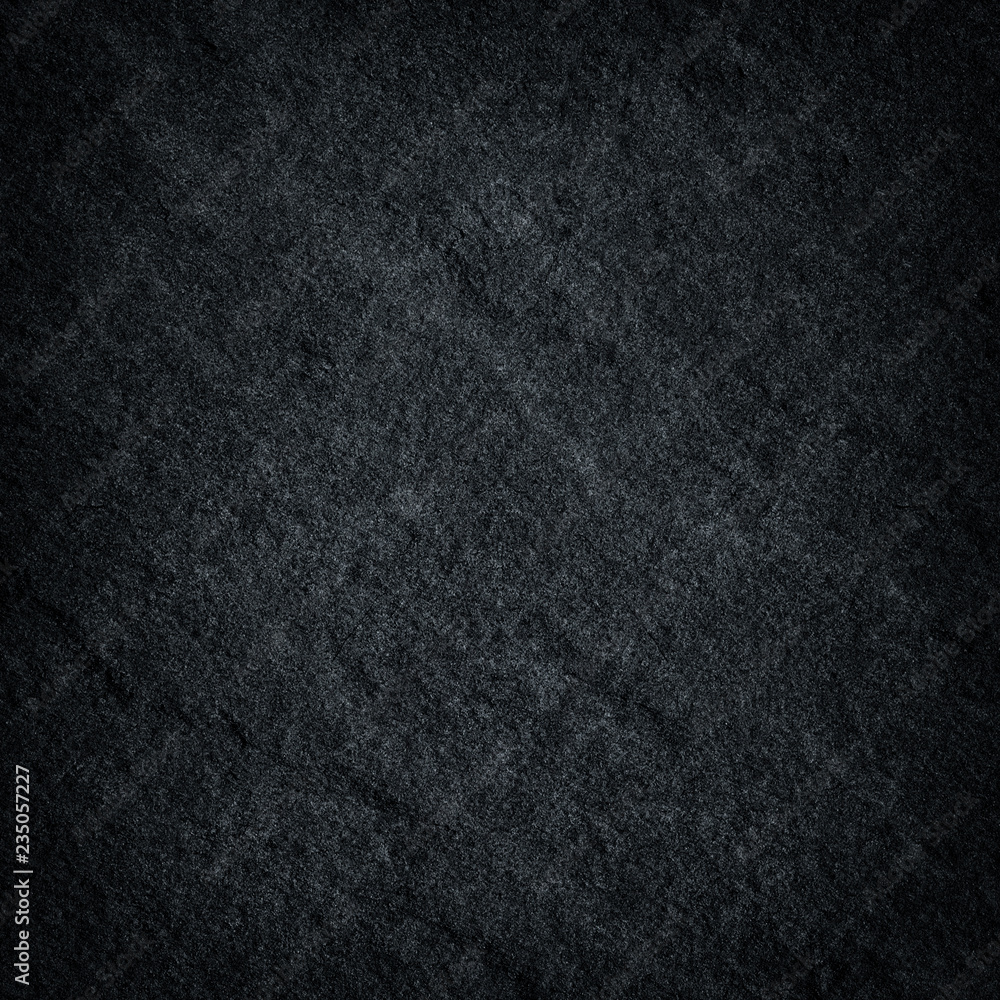 Fototapeta premium Dark grey black slate stone background or texture.