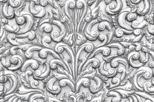 close-up pattern of carving silverware