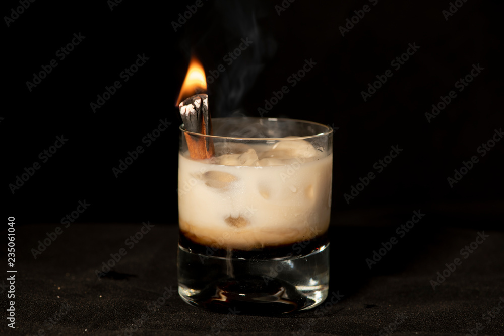 Flaming Cinnamon cocktail with kahlua, baileys irish cream and sambuca Flaming Cinnamon cocktail with kahlua, baileys irish cream and sambuca
