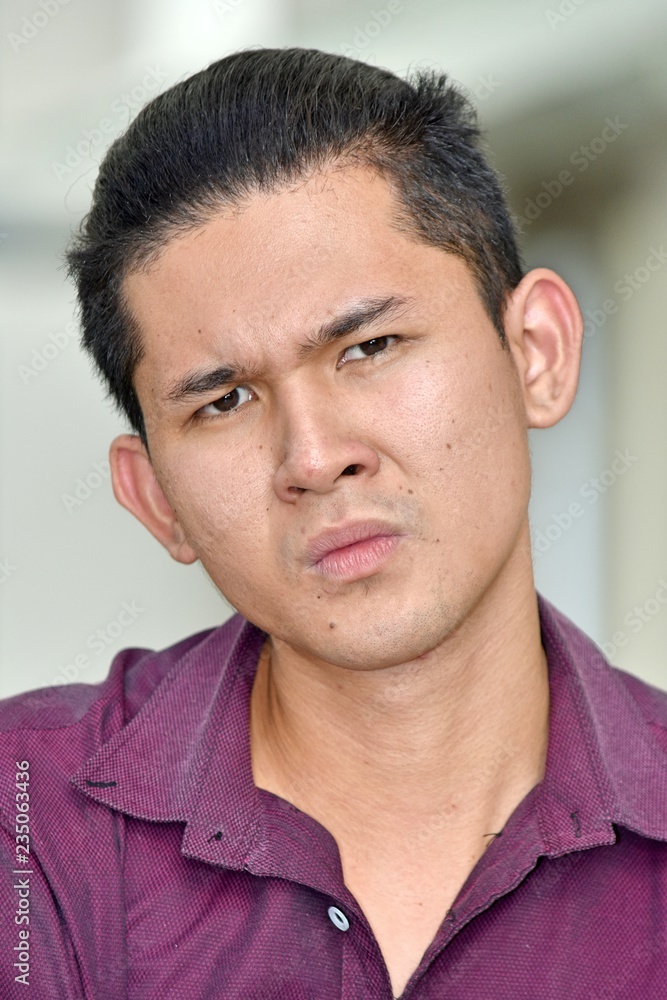 Fototapeta premium Confused Handsome Asian Male