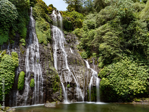 Beautiful Twin waterfall cascade in tropical green forest. Banyumala  North Bali  Indonesia  October 2018