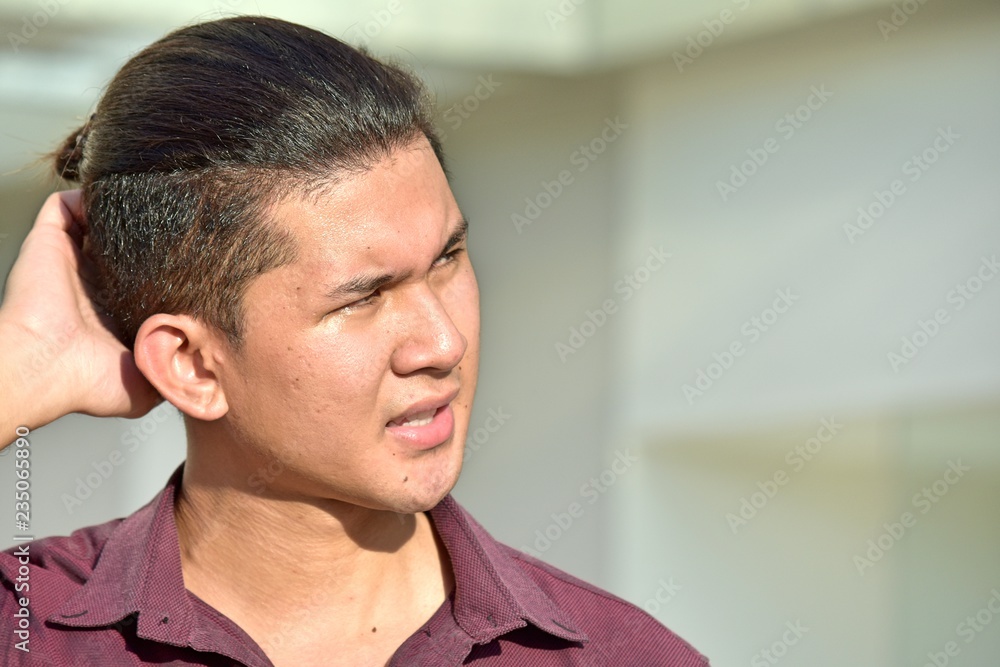 Fototapeta premium Confused Handsome Minority Male