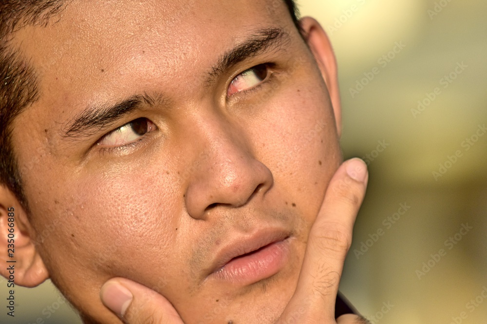 Obraz premium Thoughtful Handsome Filipino Person