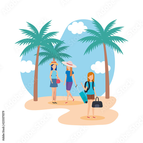 tourists girls with suitcases on the beach