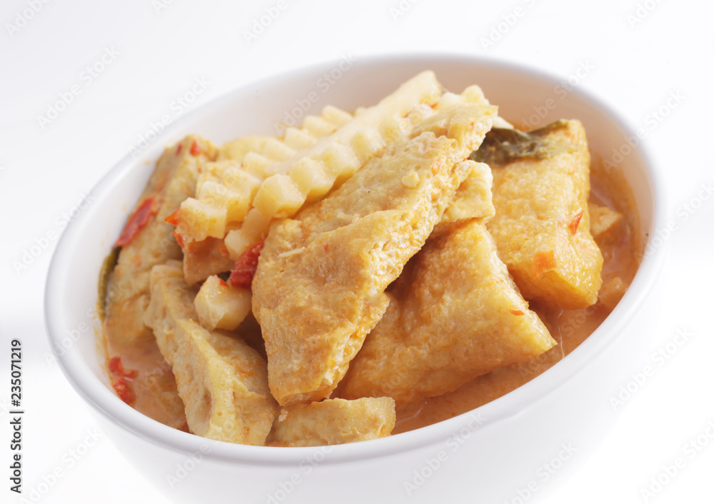 Thai style tofu red curry, vegetable food white background Thai style tofu red curry, vegetable food white background