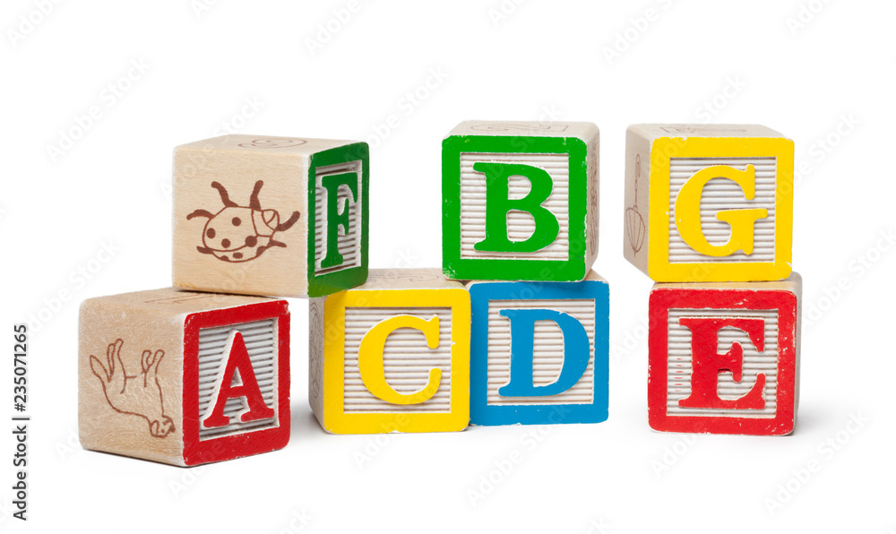 Wooden alphabet blocks isolated on white background Wooden alphabet blocks isolated on white background