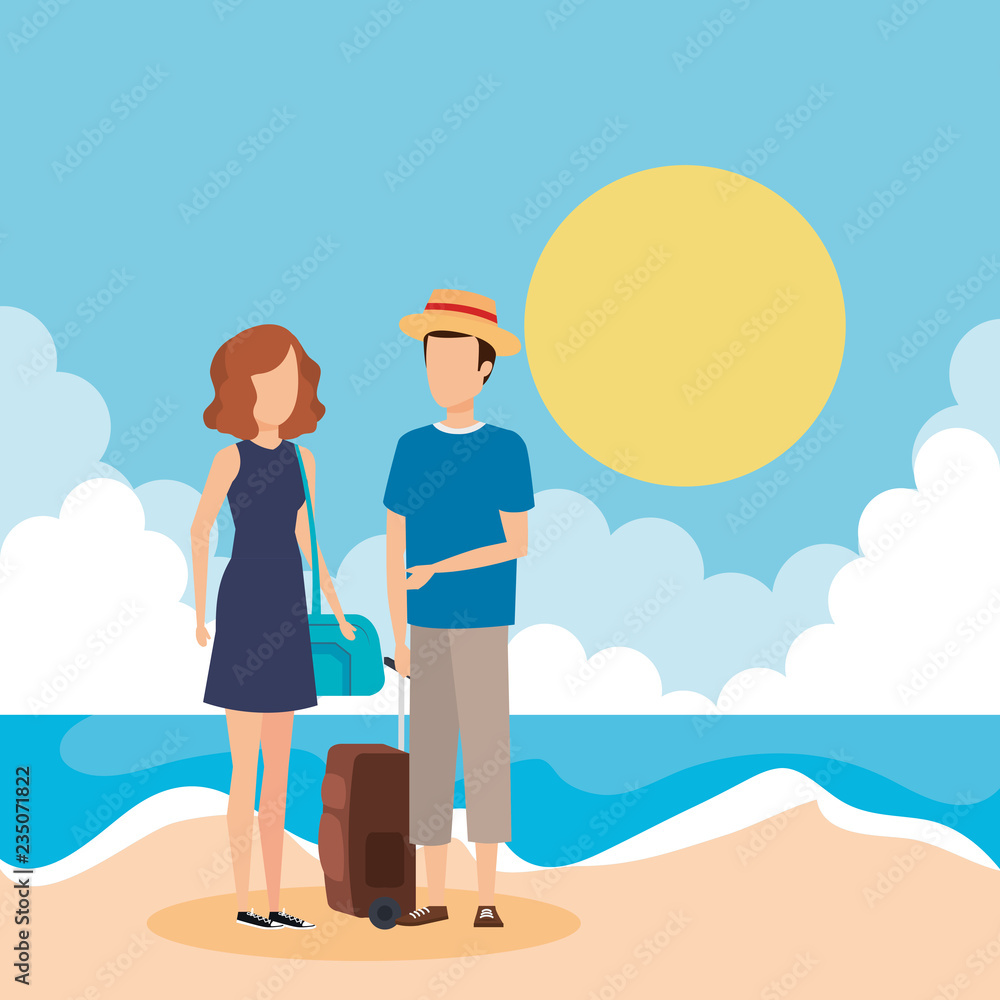 young couple with suitcase on the beach young couple with suitcase on the beach