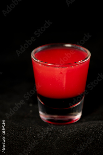 Red shot cocktail with jagermeister, cranberry juice and schnapps