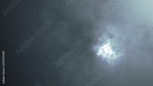 lightning behind thunderstorm clouds