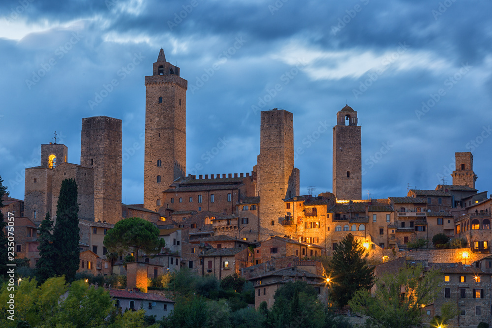Beautiful view of the medieval town of San Gimignano in night, Tuscany, Italy