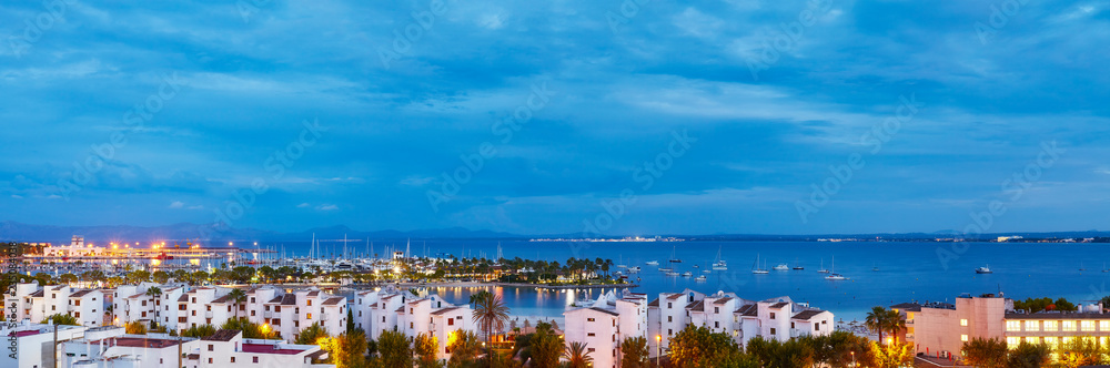 Panoramic view of Port de Alcudia at sunrise, Mallorca, Spain.
