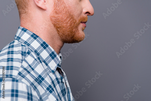 Well groomed guy. Cropped close-up profile side portrait of nice