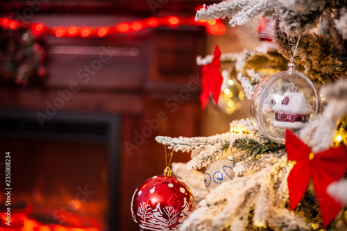 Decorated Christmas tree on blurred, sparkling and fairy background. Merry Christmas.