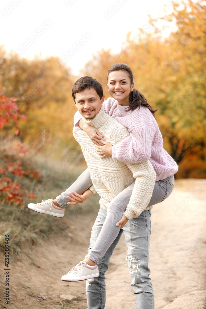 Couple in love in the autumn leaves Couple in love in the autumn leaves