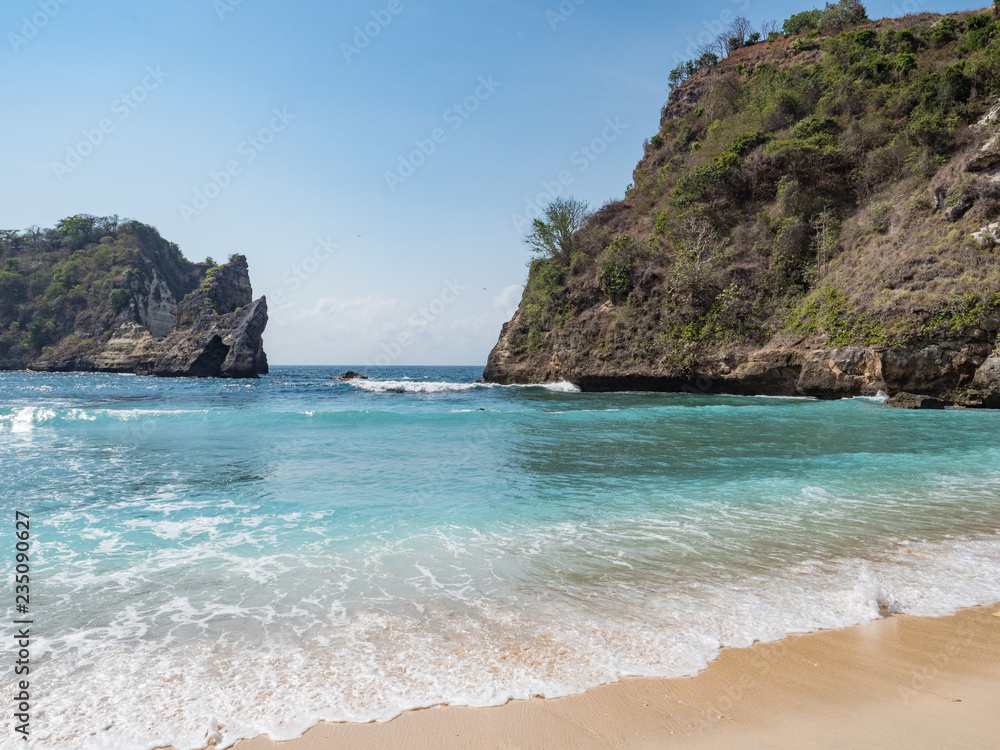 Clear waves of blue ocean, Atuh Beach, Nusa Penida, Indonesia. Landscape of paradise. October 2018
