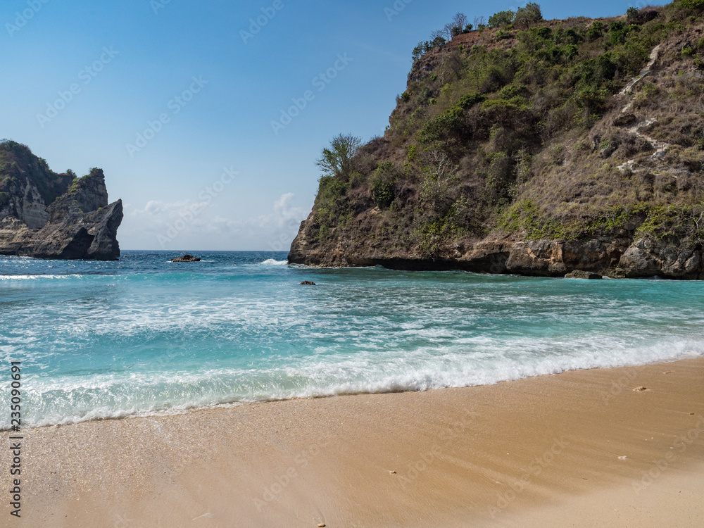 Clear waves of blue ocean, Atuh Beach, Nusa Penida, Indonesia. Landscape of paradise. October 2018