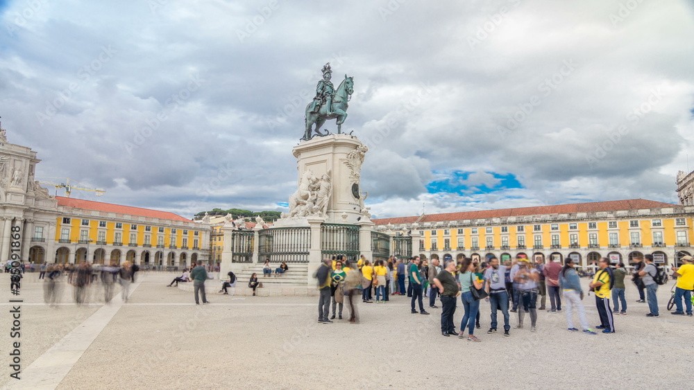 Bronze statue of King Jose I and triumphal arch at Rua Augusta at Commerce square timelapse hyperlapse in Lisbon, Portugal.