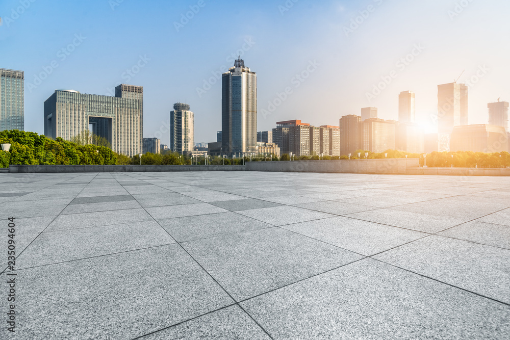 Panoramic skyline and buildings with empty square floor.