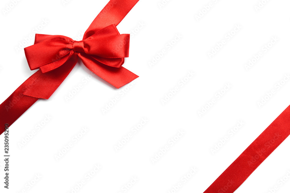 Shiny red satin ribbon on white background Shiny red satin ribbon on white background
