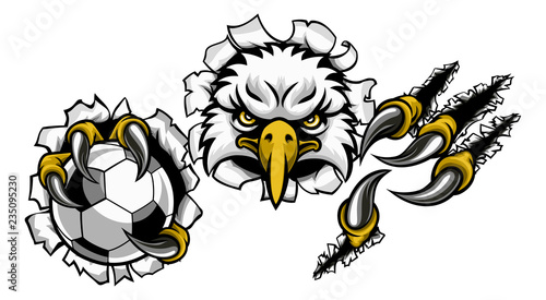 An eagle bird soccer football sports mascot cartoon character ripping through the background holding a ball