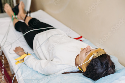 patient with encephalography electrode. medical examination Electroencephalogram studying the vascular system of the brain (EEG)