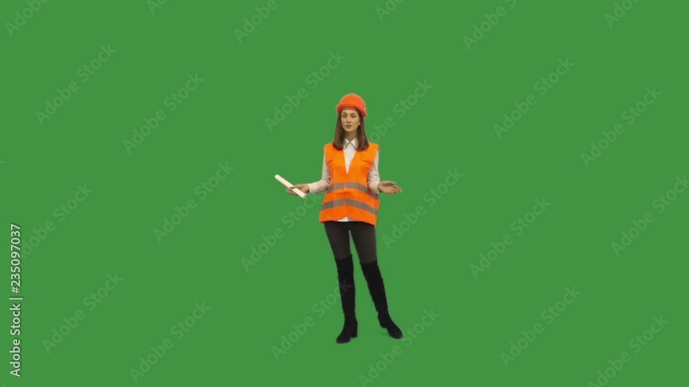woman in helmet on a green screen woman in helmet on a green screen