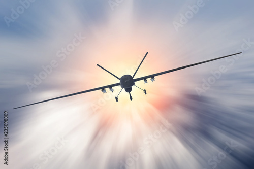 Unmanned military drone uav flying at high speed in the clouds