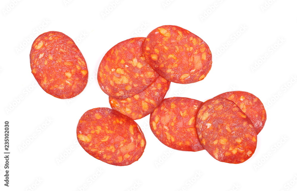 Spicy salami sausage slices isolated on white background, top view Spicy salami sausage slices isolated on white background, top view