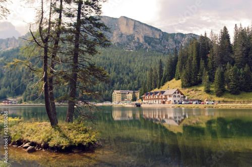 Auronzo di Cadore, Italy August 9, 2018: Misurina Mountain Lake. Beautiful tourist place with houses and cafes.