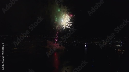 Fireworks display over Reykjavik harbor during a fireworks show at christmas