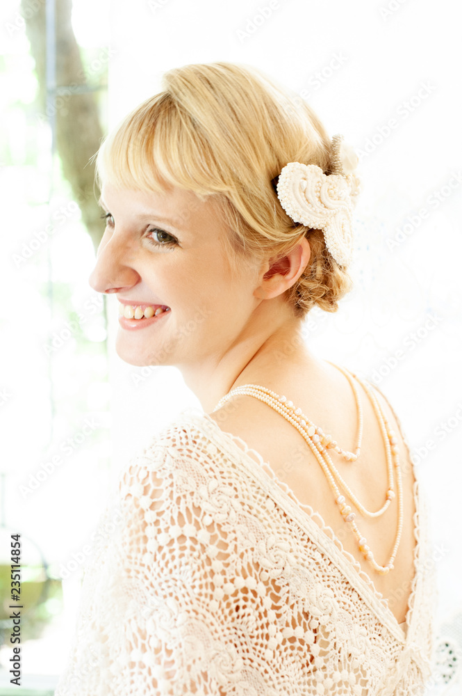 Caucasian female model poses for wedding pictures in the studio Caucasian female model poses for wedding pictures in the studio