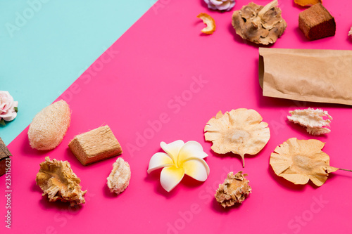 Closeup of beautiful Spa items on a pink background with copy space for text