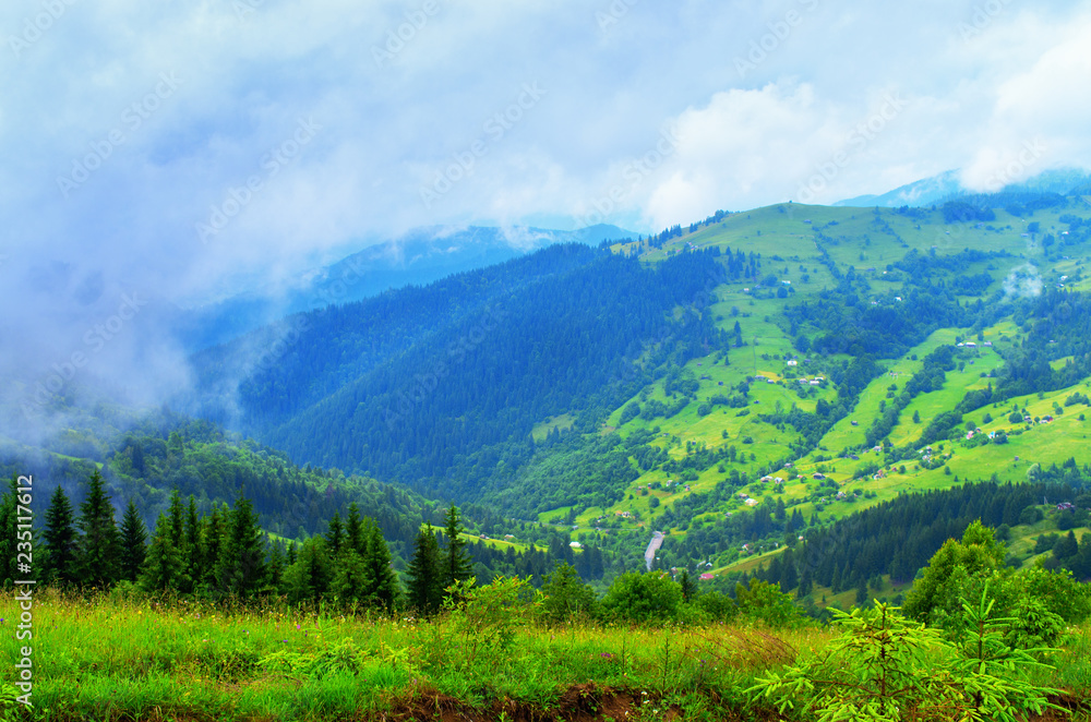 hillsides beautiful mountain landscape, the village home. Ukraine Carpathians