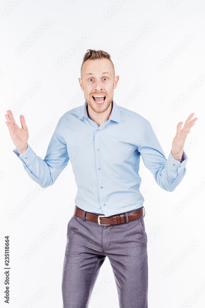 Man on a white studio background.. emotions and people concept. Man on a white studio background.. emotions and people concept.