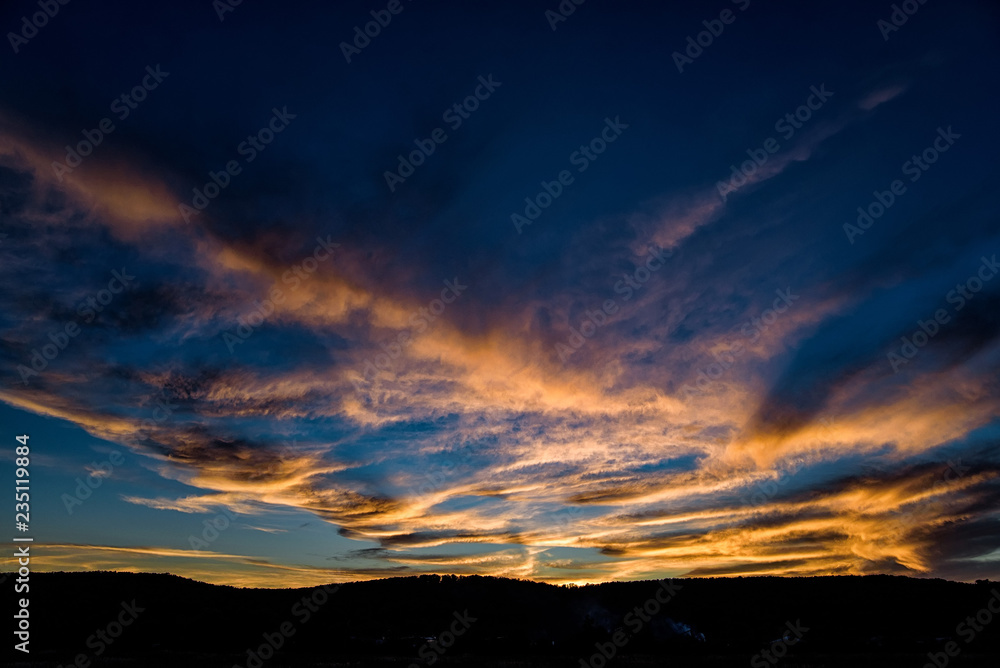 Dramatic blue sunset sky with pink clouds Dramatic blue sunset sky with pink clouds