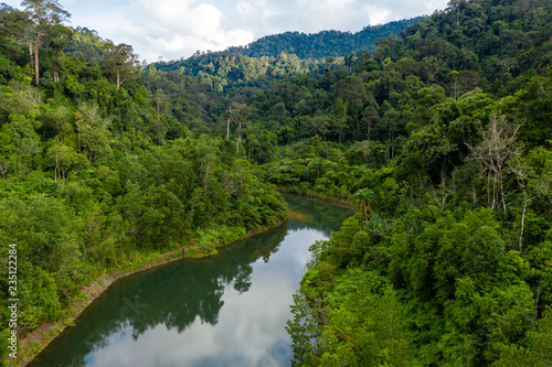 Aerial view of dense, mountainous tropical rainforest in Thailand