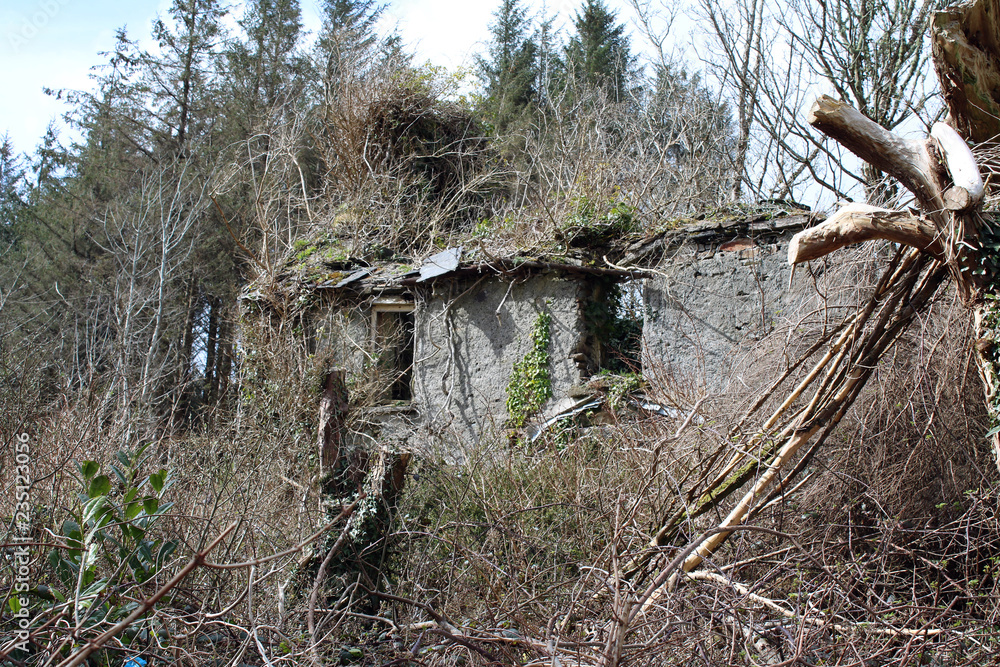 Old house by the side of the road falling apart Old house by the side of the road falling apart